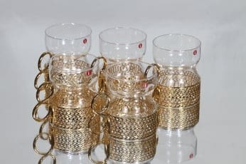 Iittala Tsaikka teelasit, kirkas, 5 kpl, suunnittelija Timo Sarpaneva, kullattu