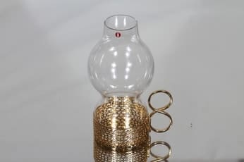 Iittala Karaatti kynttilälyhty, kirkas, suunnittelija Timo Sarpaneva, metallikahva, kullattu