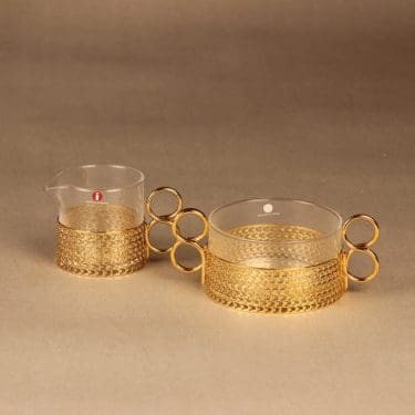 Iittala 24 carat sokerikko ja kermakko, kultainen pidike, suunnittelija Timo Sarpaneva, kultainen pidike